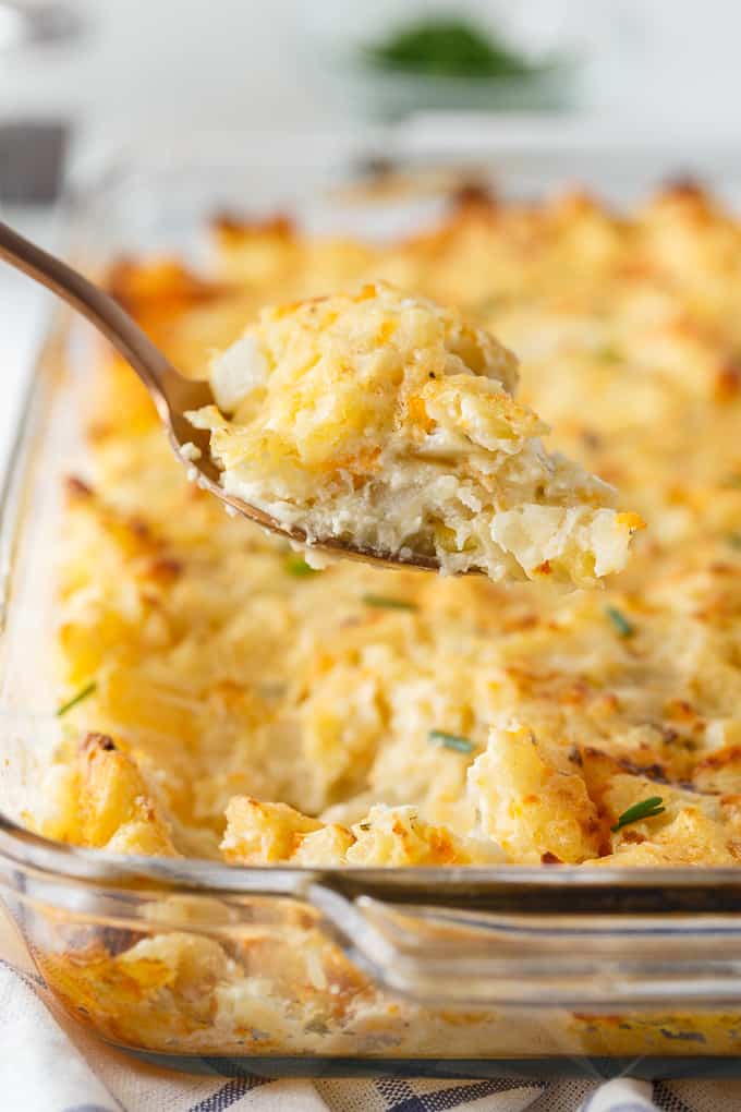 Party Potatoes - Super creamy and cheesy! This easy side dish is perfect for potlucks. Save time by using hash browns!