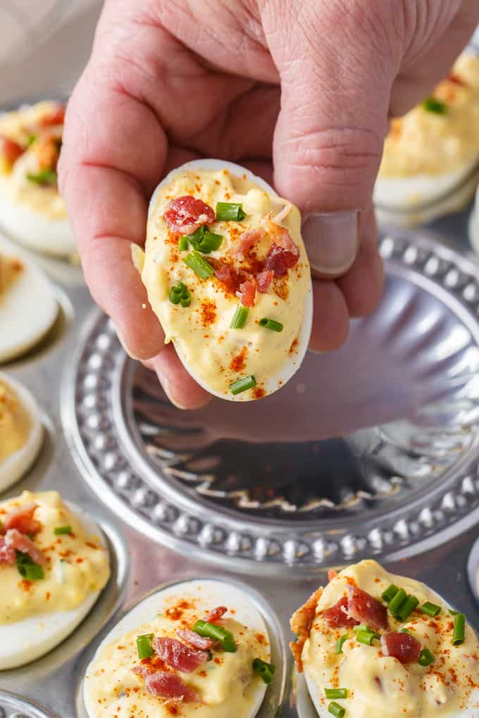 Bacon Ranch Deviled Eggs - A delicious savoury twist on classic deviled eggs! The filling is a divine mixture of creamy ranch dressing, bacon, Dijon mustard and chives. 