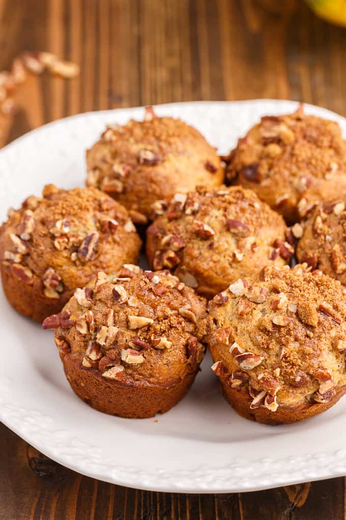 Banana Streusel Muffins - This easy muffin recipe is similar to the muffins you would get at your local coffee shop. They are moist and soft and full of delicious banana flavor. The streusel topping gives a sweet crunch to every bite.