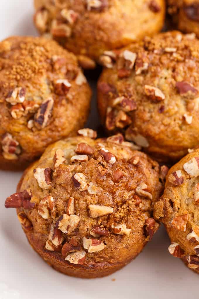Banana Streusel Muffins - This easy muffin recipe is similar to the muffins you would get at your local coffee shop. They are moist and soft and full of delicious banana flavor. The streusel topping gives a sweet crunch to every bite.