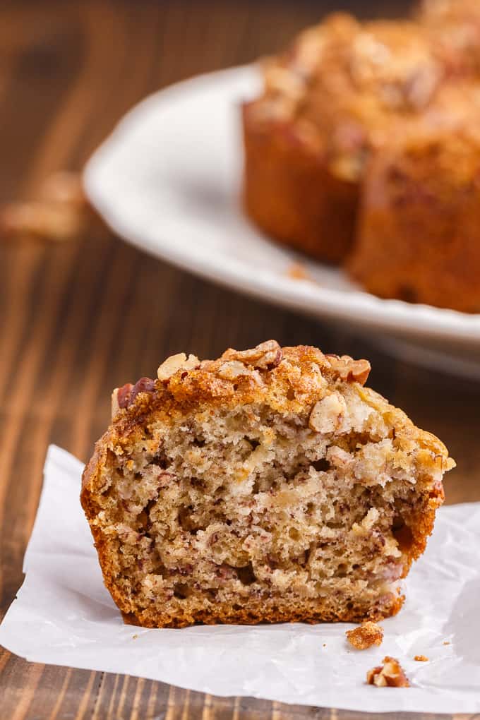 Banana Streusel Muffins - This easy muffin recipe is similar to the muffins you would get at your local coffee shop. They are moist and soft and full of delicious banana flavor. The streusel topping gives a sweet crunch to every bite.