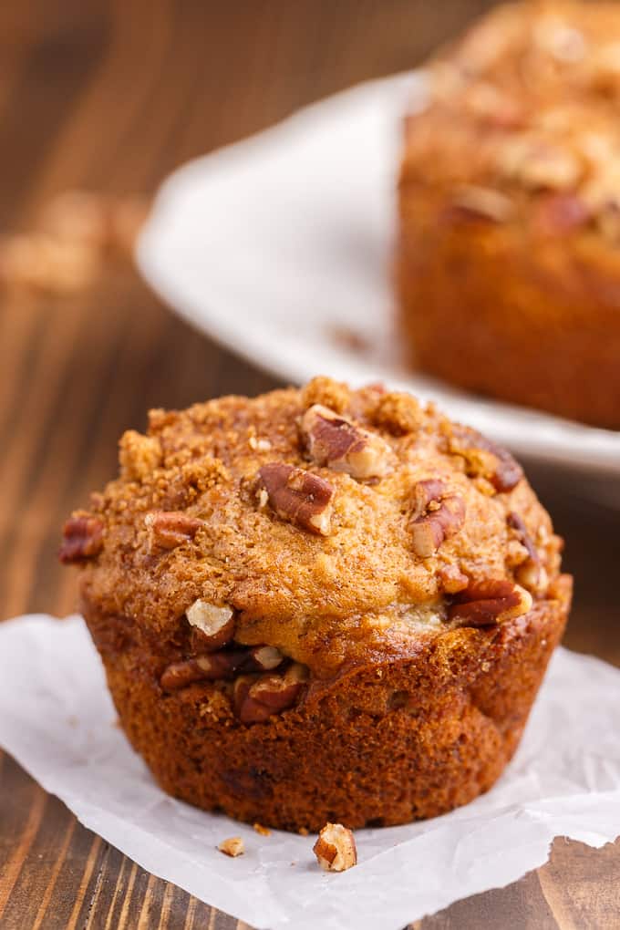 Banana Streusel Muffins - This easy muffin recipe is similar to the muffins you would get at your local coffee shop. They are moist and soft and full of delicious banana flavor. The streusel topping gives a sweet crunch to every bite.