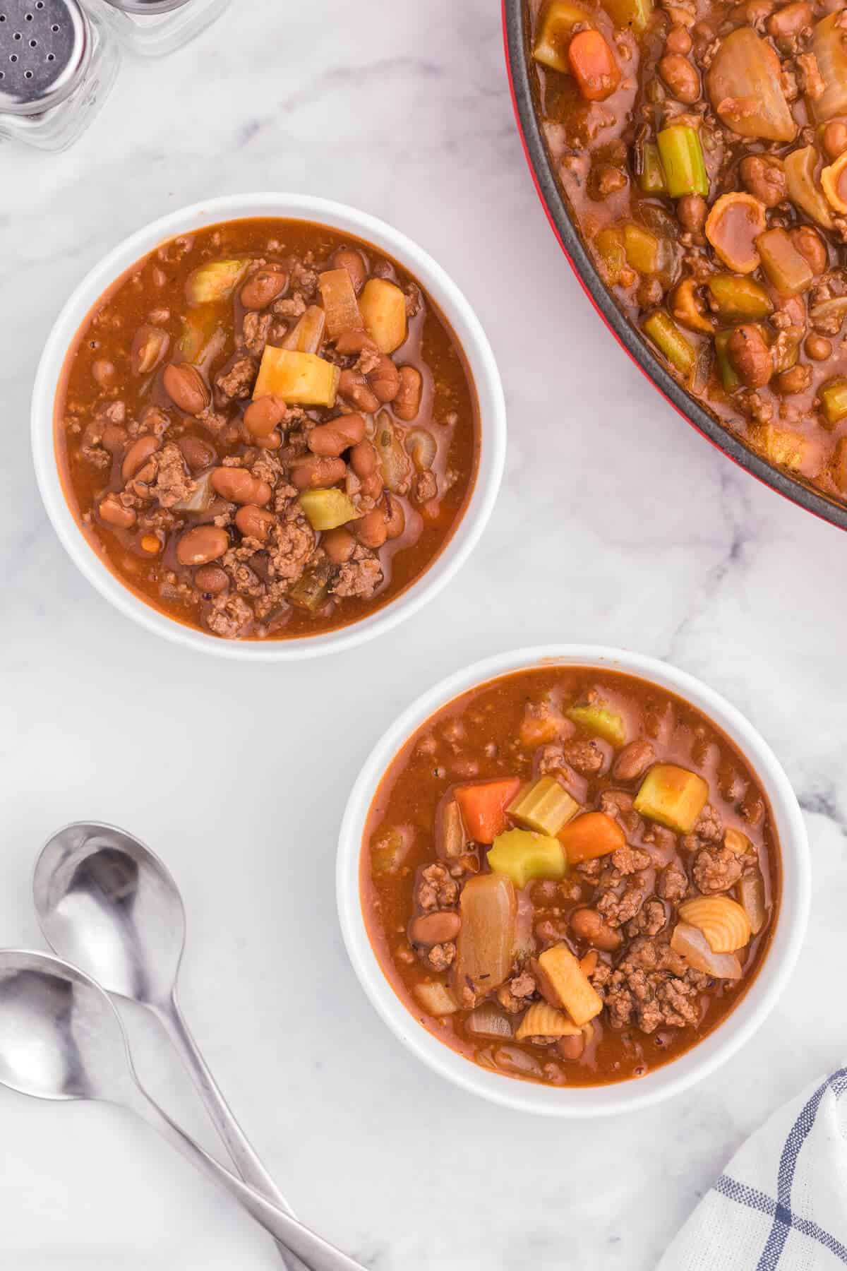 Hodge Podge Soup - A hearty soup recipe like grandma used to make. It's a clean out your kitchen kind of meal with two cans of soup, pork and beans, ground beef and celery. Perfect for busy days!