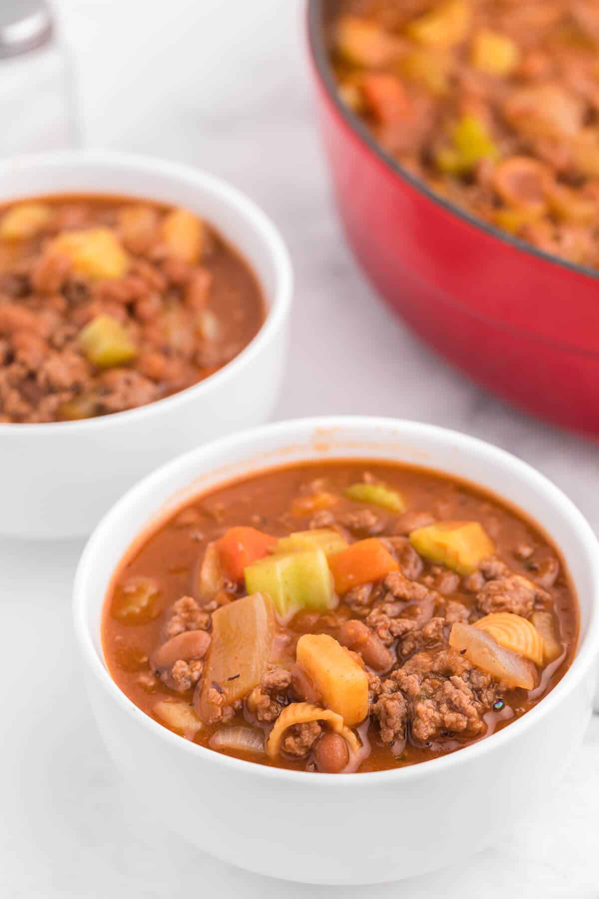 Hodge Podge Soup - A hearty soup recipe like grandma used to make. It's a clean out your kitchen kind of meal with two cans of soup, pork and beans, ground beef and celery. Perfect for busy days!