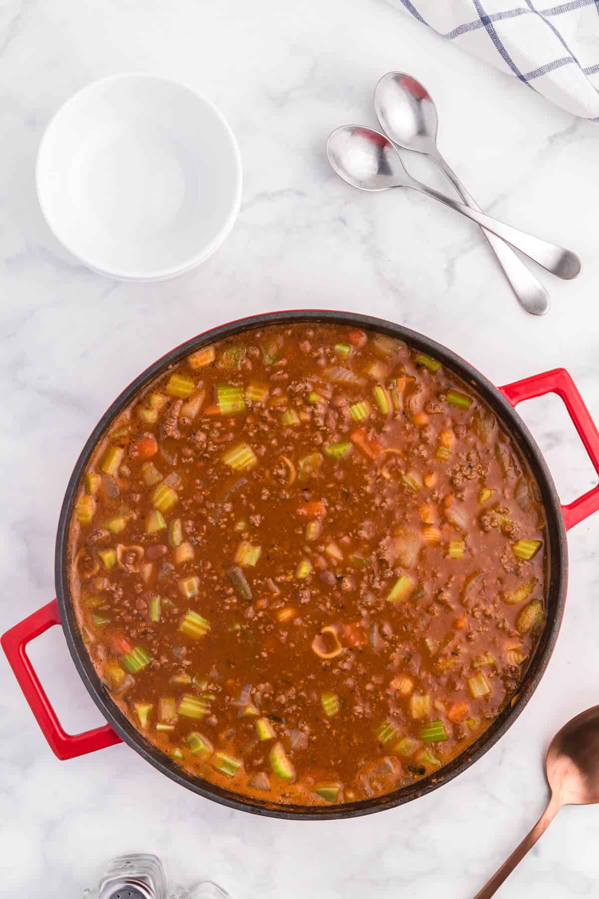 Hodge Podge Soup - A hearty soup recipe like grandma used to make. It's a clean out your kitchen kind of meal with two cans of soup, pork and beans, ground beef and celery. Perfect for busy days!