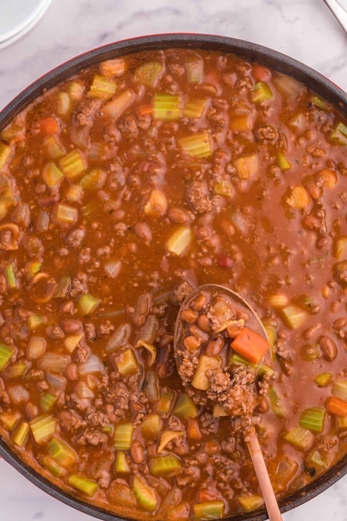 Hodge Podge Soup - A hearty soup recipe like grandma used to make. It's a clean out your kitchen kind of meal with two cans of soup, pork and beans, ground beef and celery. Perfect for busy days!