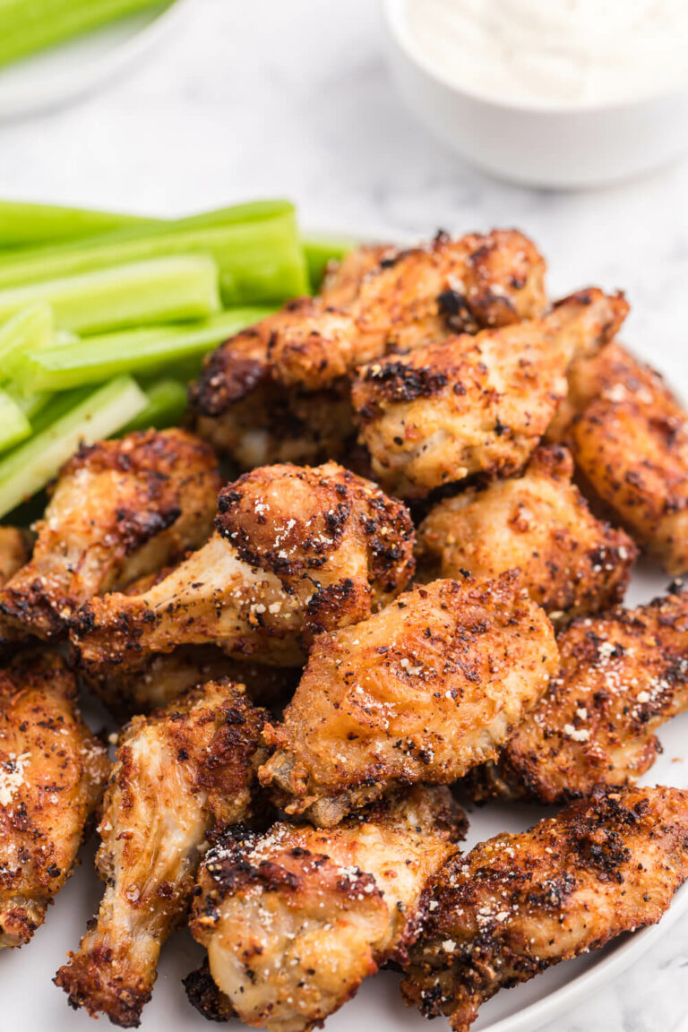 A plate of the recipe with celery sticks.