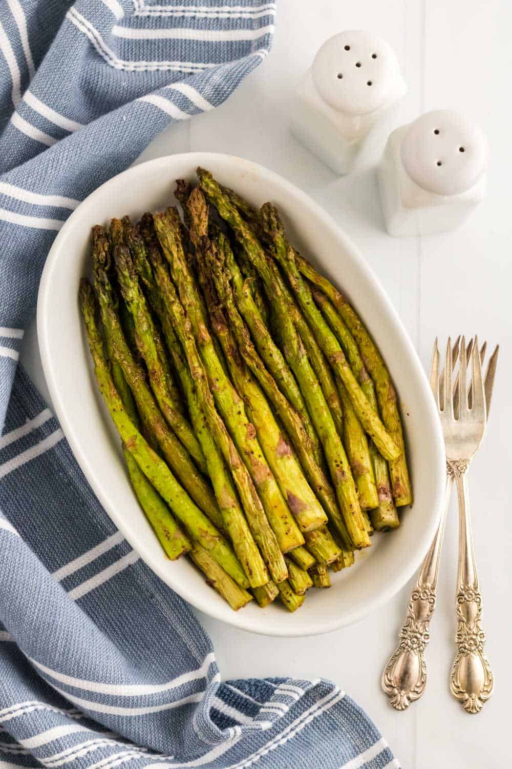 Asparagus in a white casserole dish