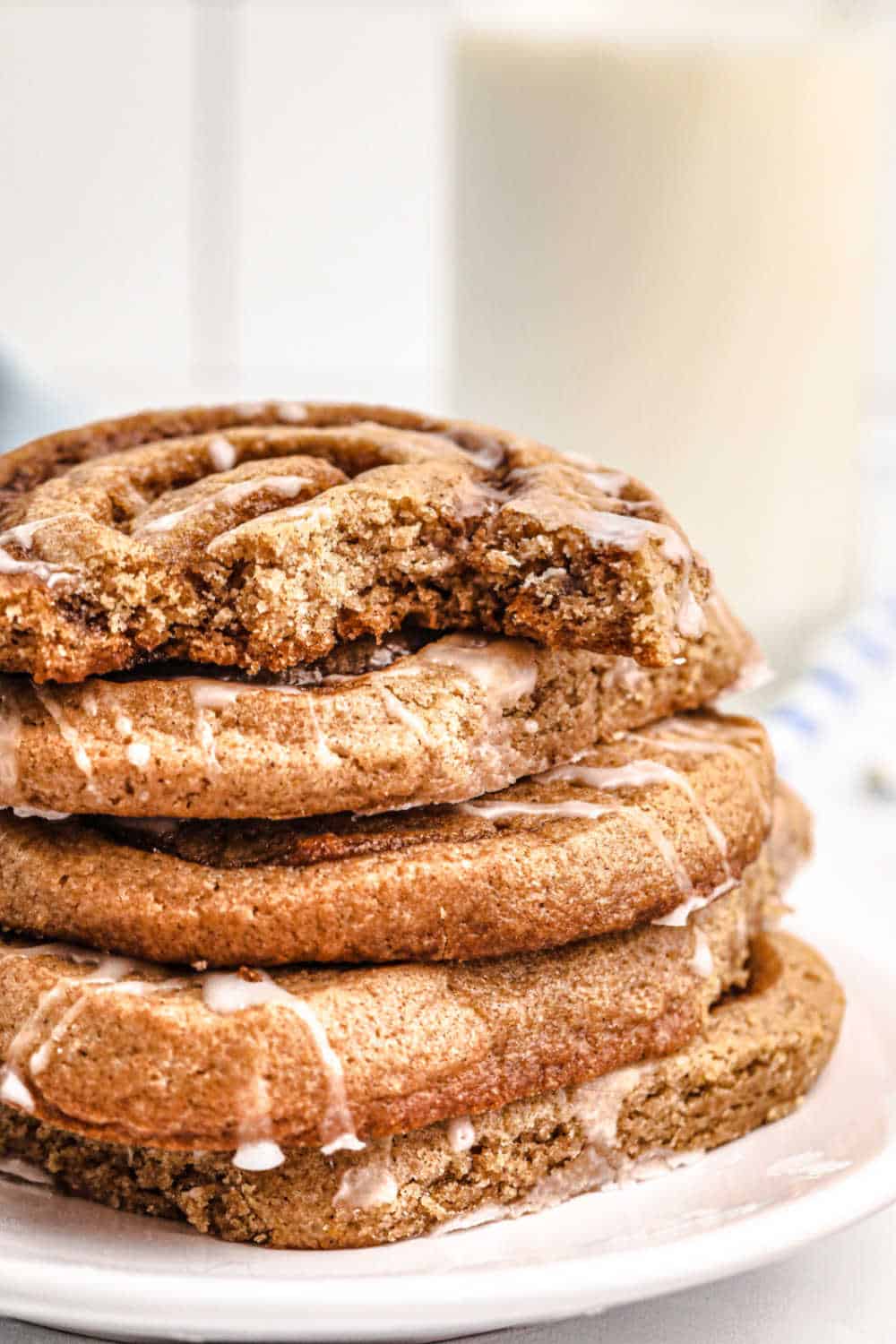 A stack of cinnamon roll cookies on a plate