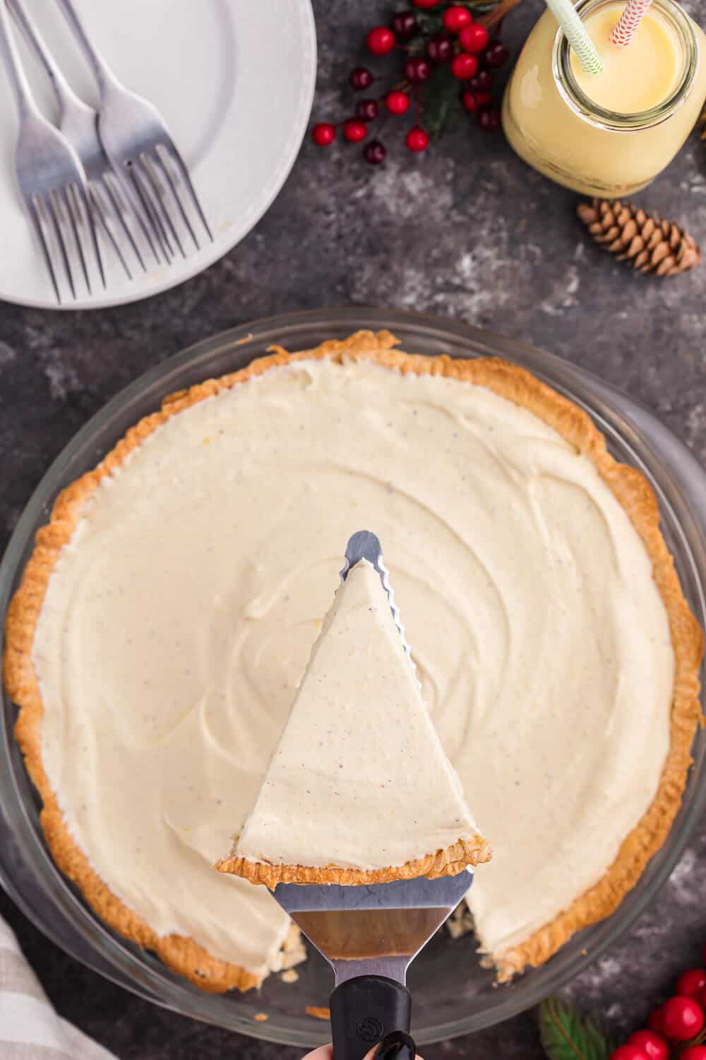 a slice of eggnog pie on a spatula