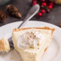 A slice of pie on a plate with a fork.
