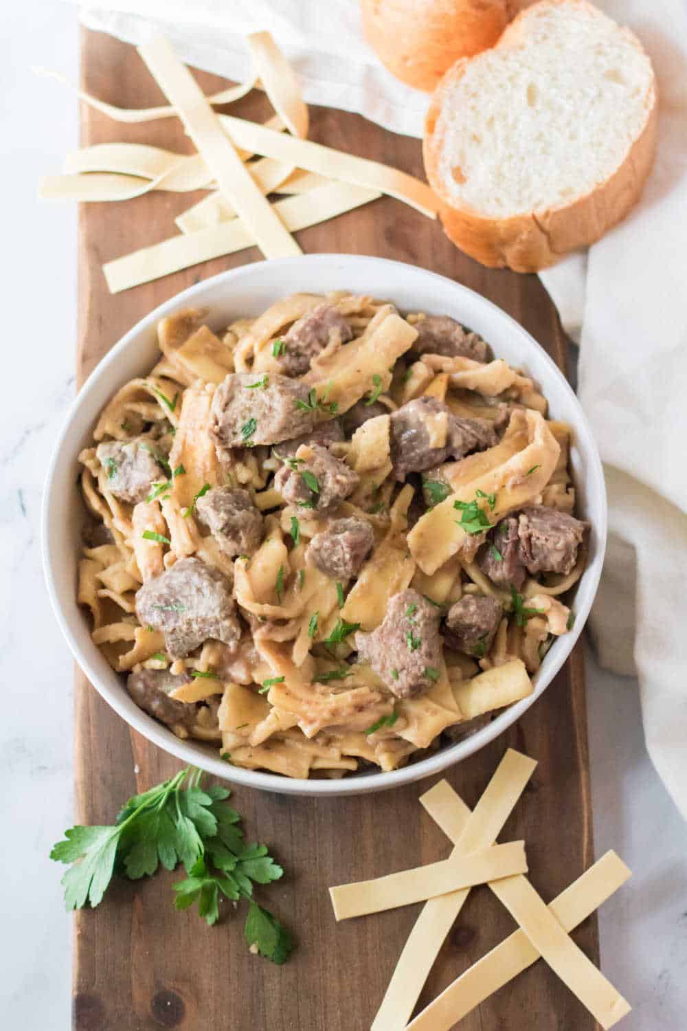 beef and noodles in a serving bowl