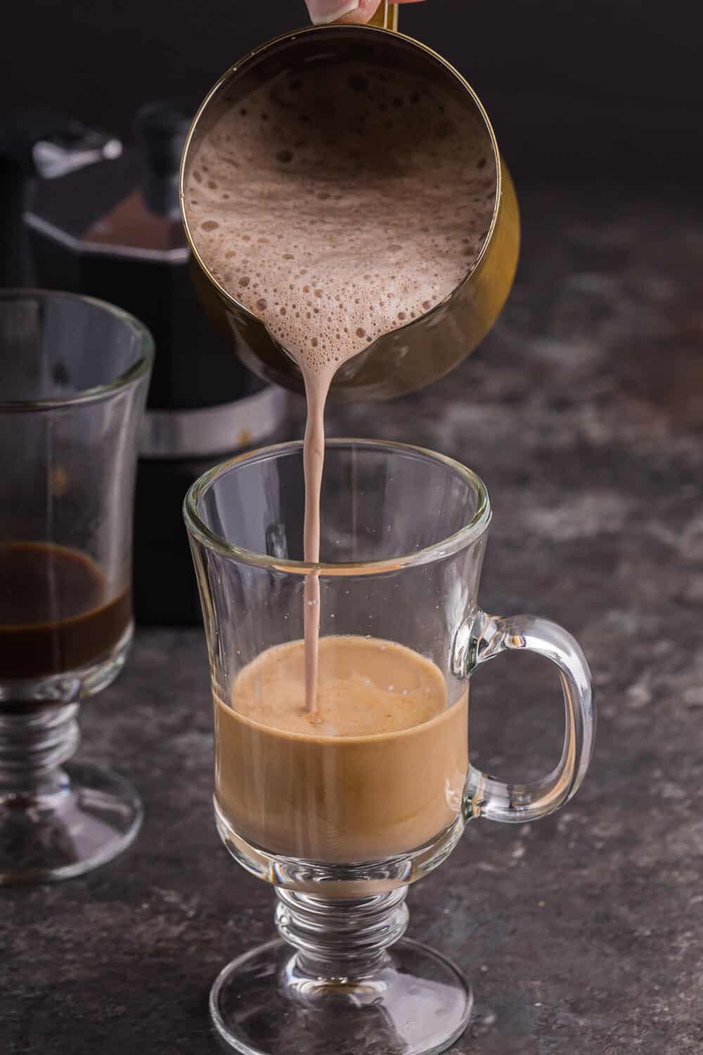 pouring the cream portion into the mug