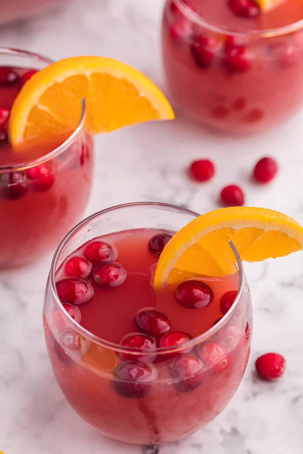 a punch glass with Christmas punch