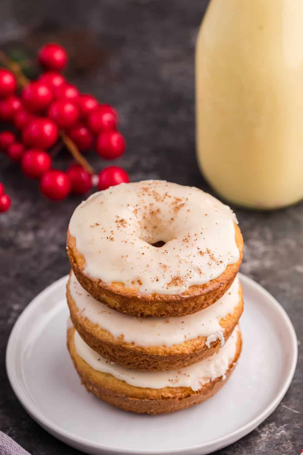 eggnog donuts stacked on plate