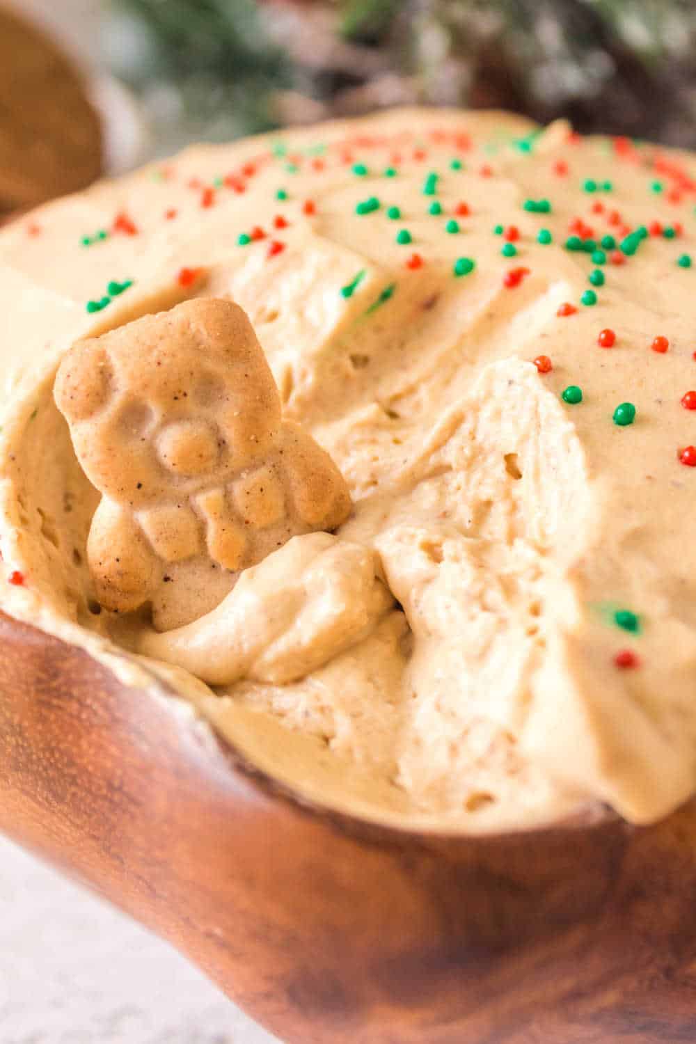 gingerbread dip with an animal cracker in it