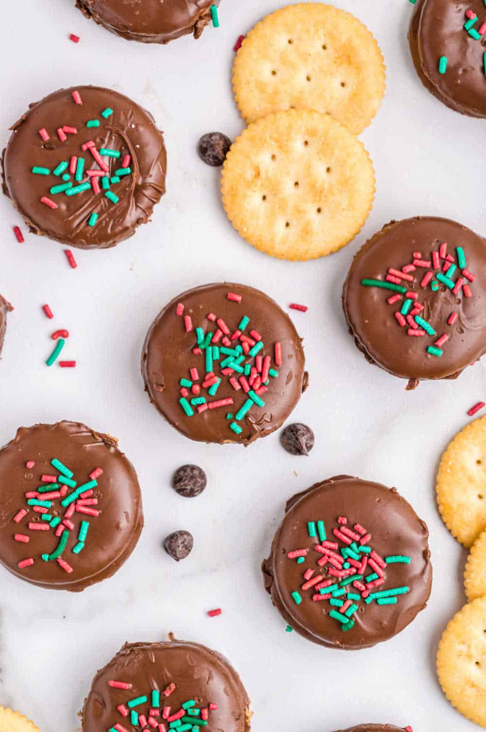 Ritz cracker cookies on a white surface