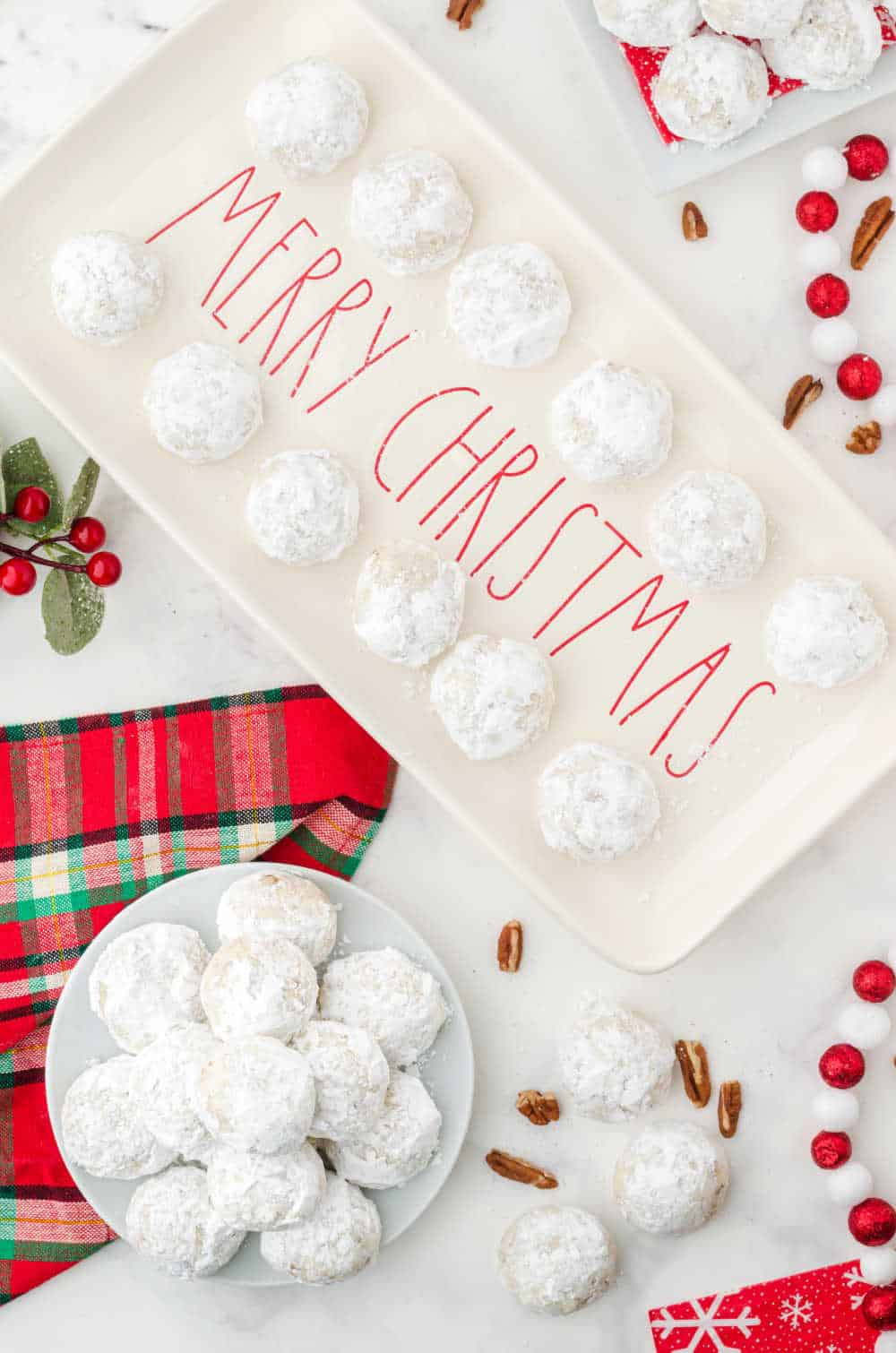 snowball cookies on a christmas platter