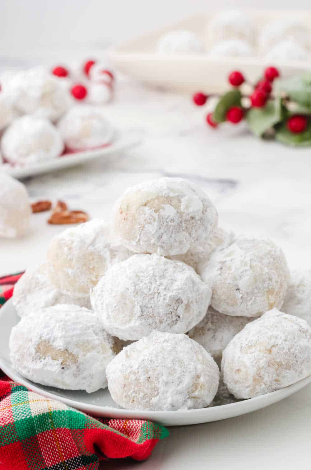 snowball cookies on a plate