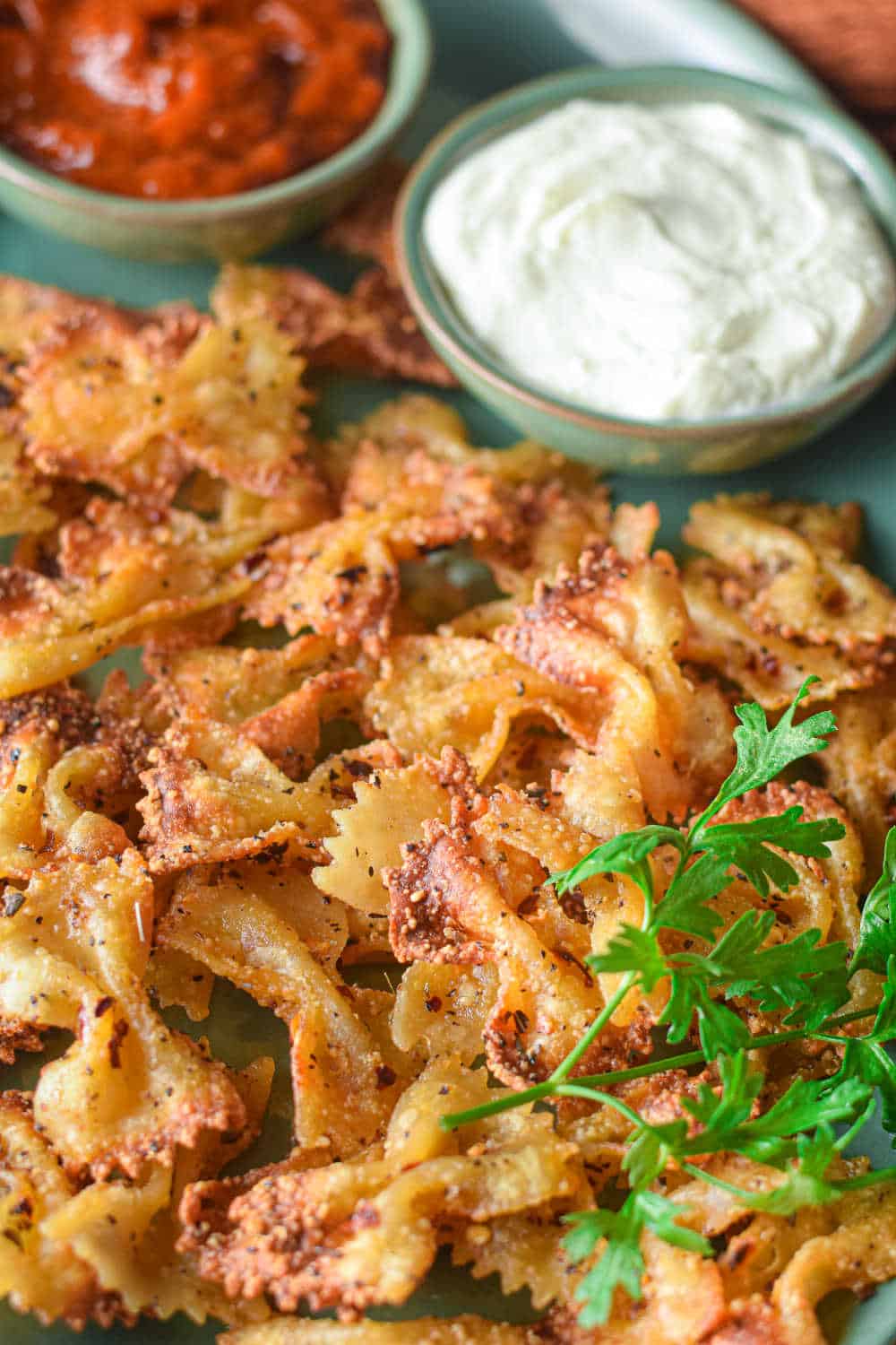 The recipe on a platter with dip.