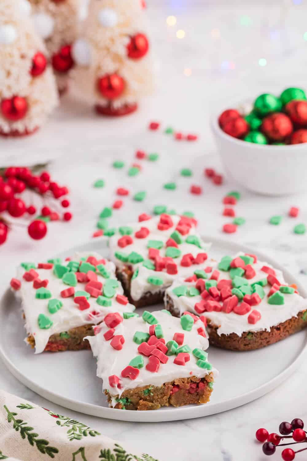 christmas chewy bars on a white plate