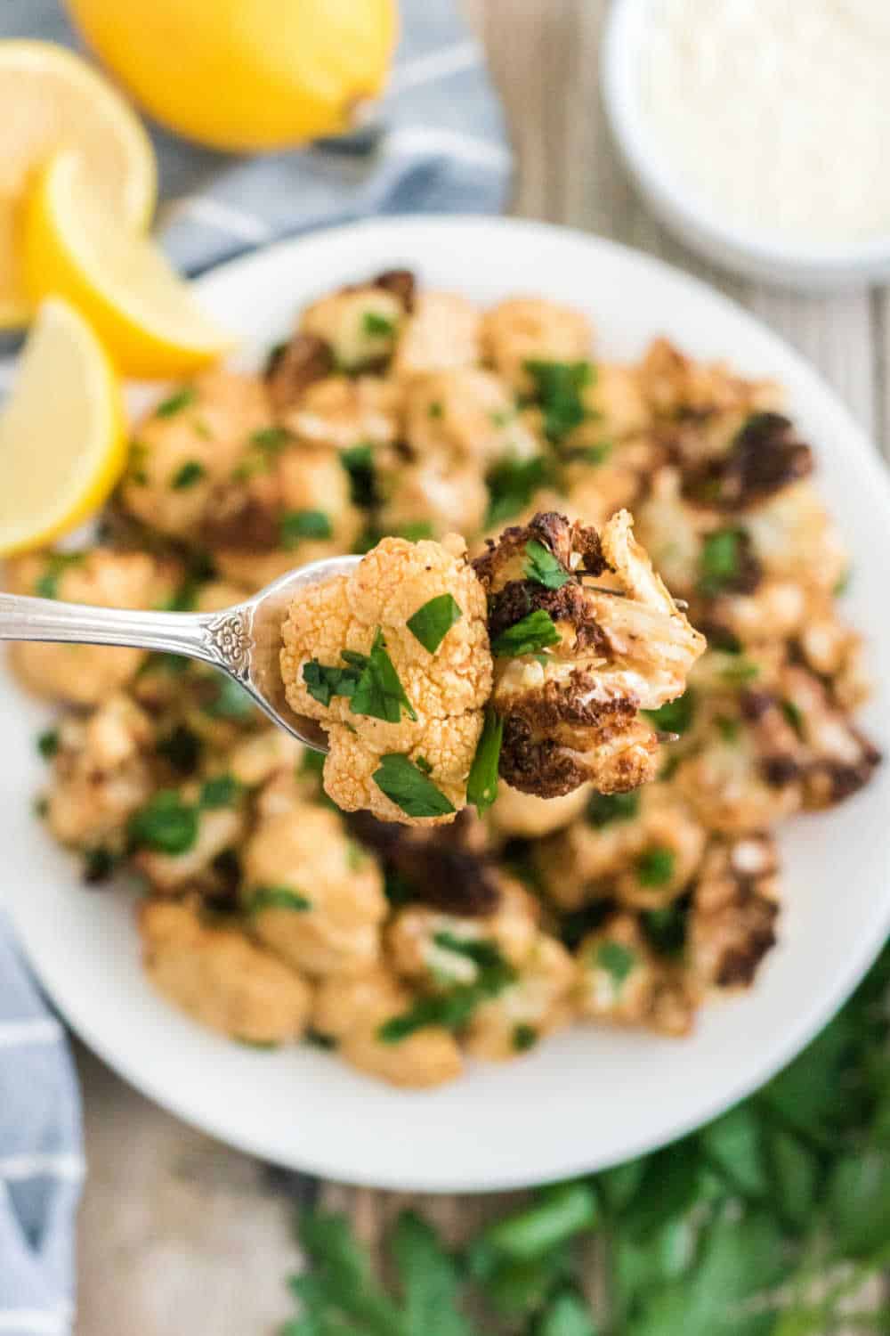 Air fryer cauliflower on a fork.