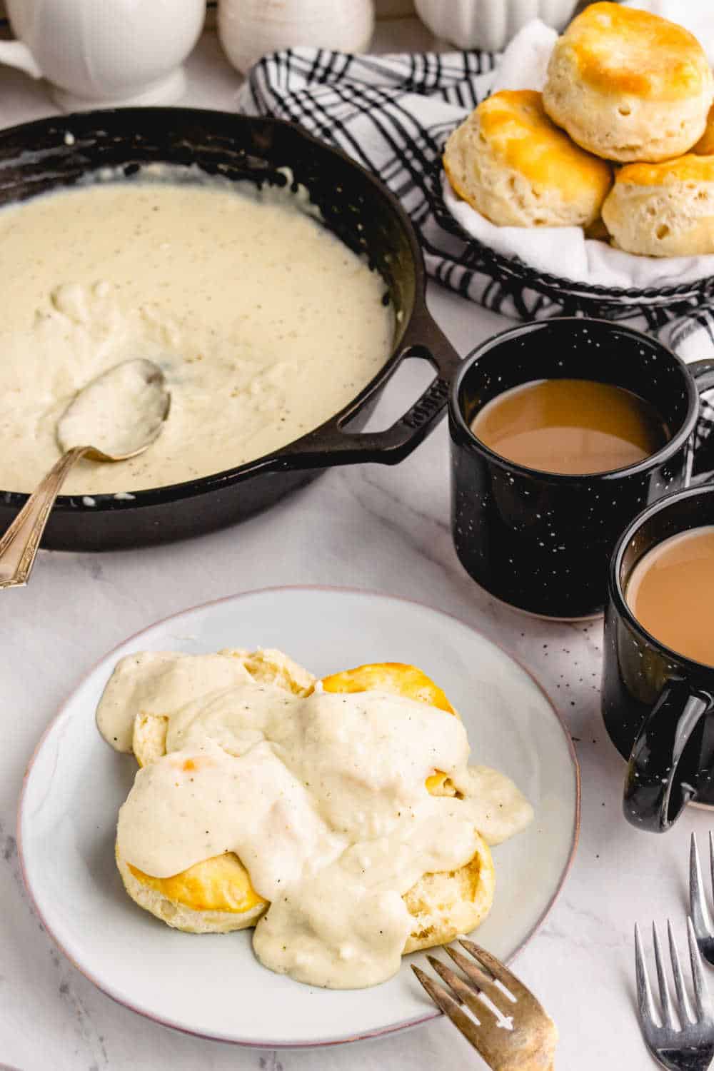 Country gravy on top of fresh biscuits.