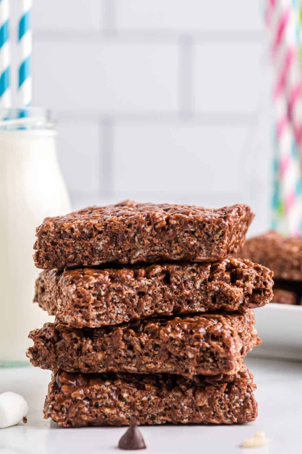 Chocolate Rice Krispie Bars stacked on top of each other.