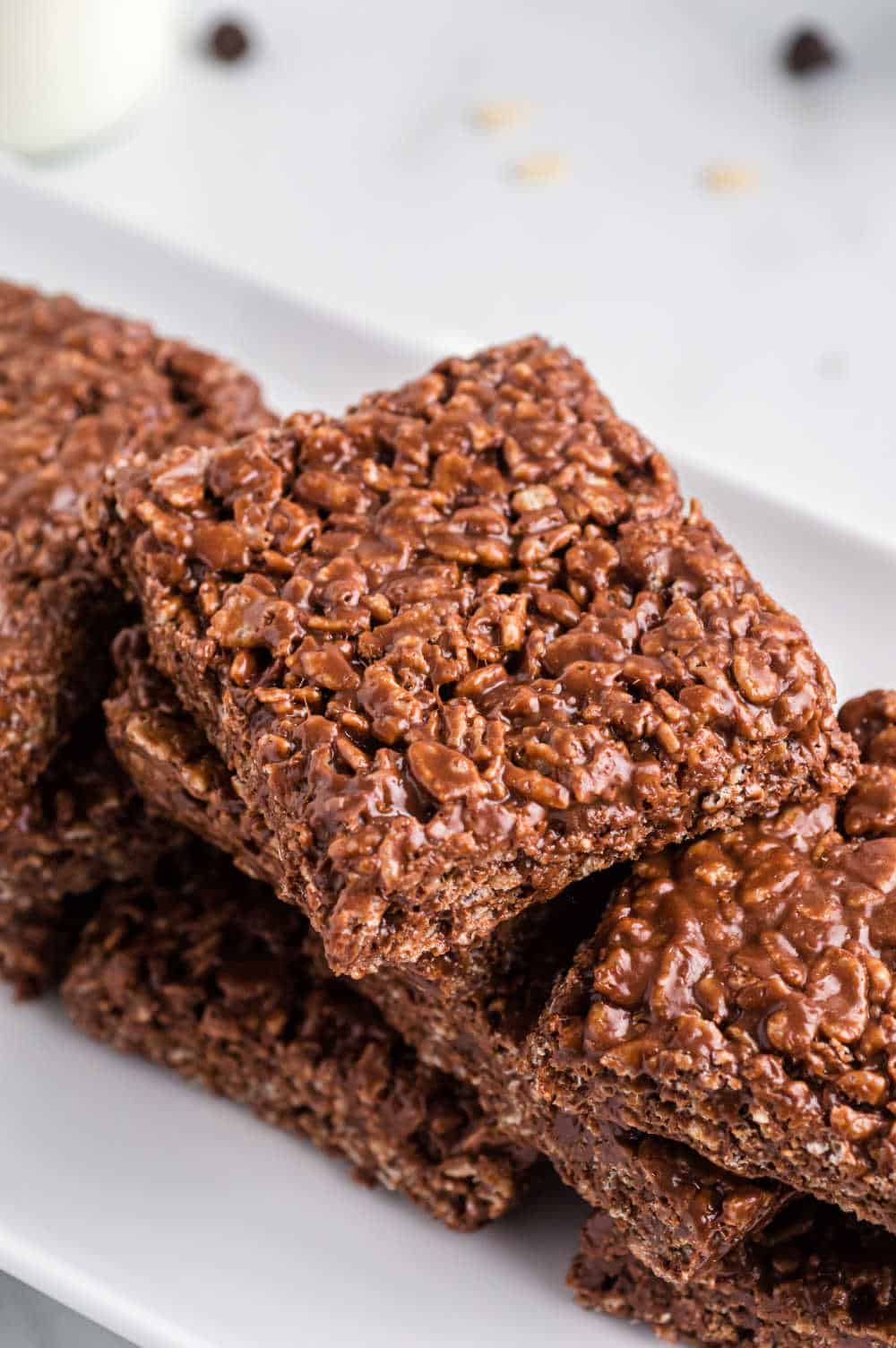 chocolate rice krispie bars on a platter.