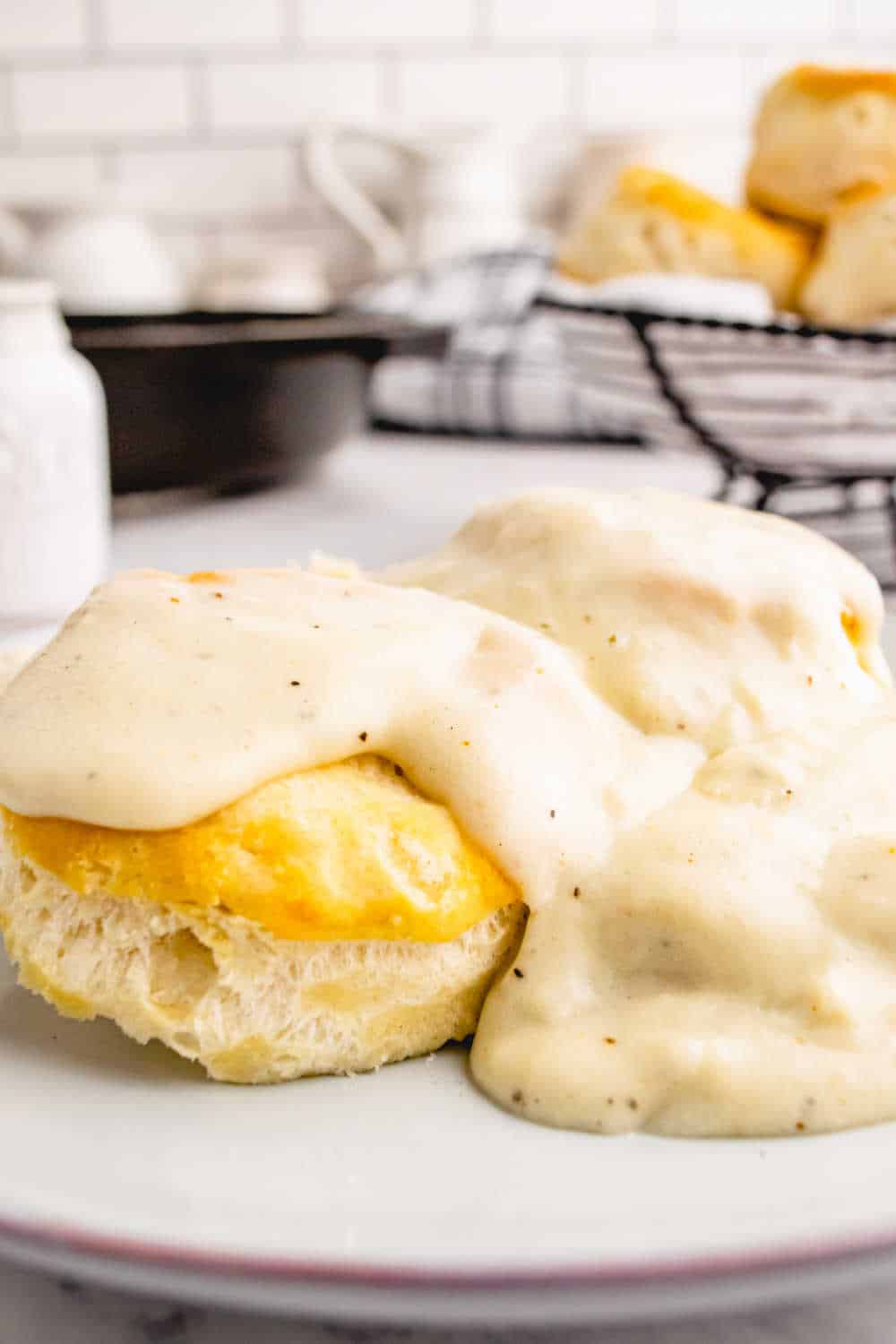 Country gravy over top of biscuits.