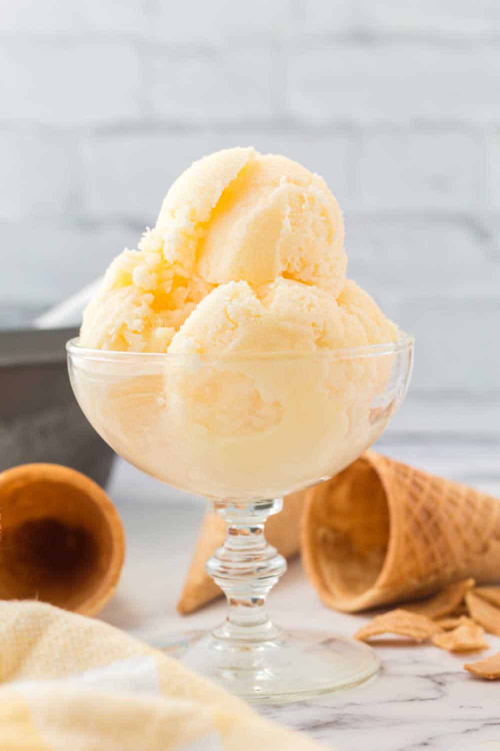 Orange sherbet in a serving dish.