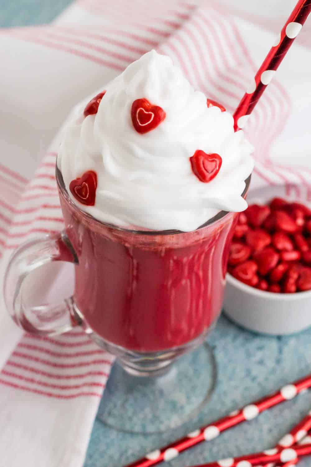 a glass mug of red velvet hot cocoa