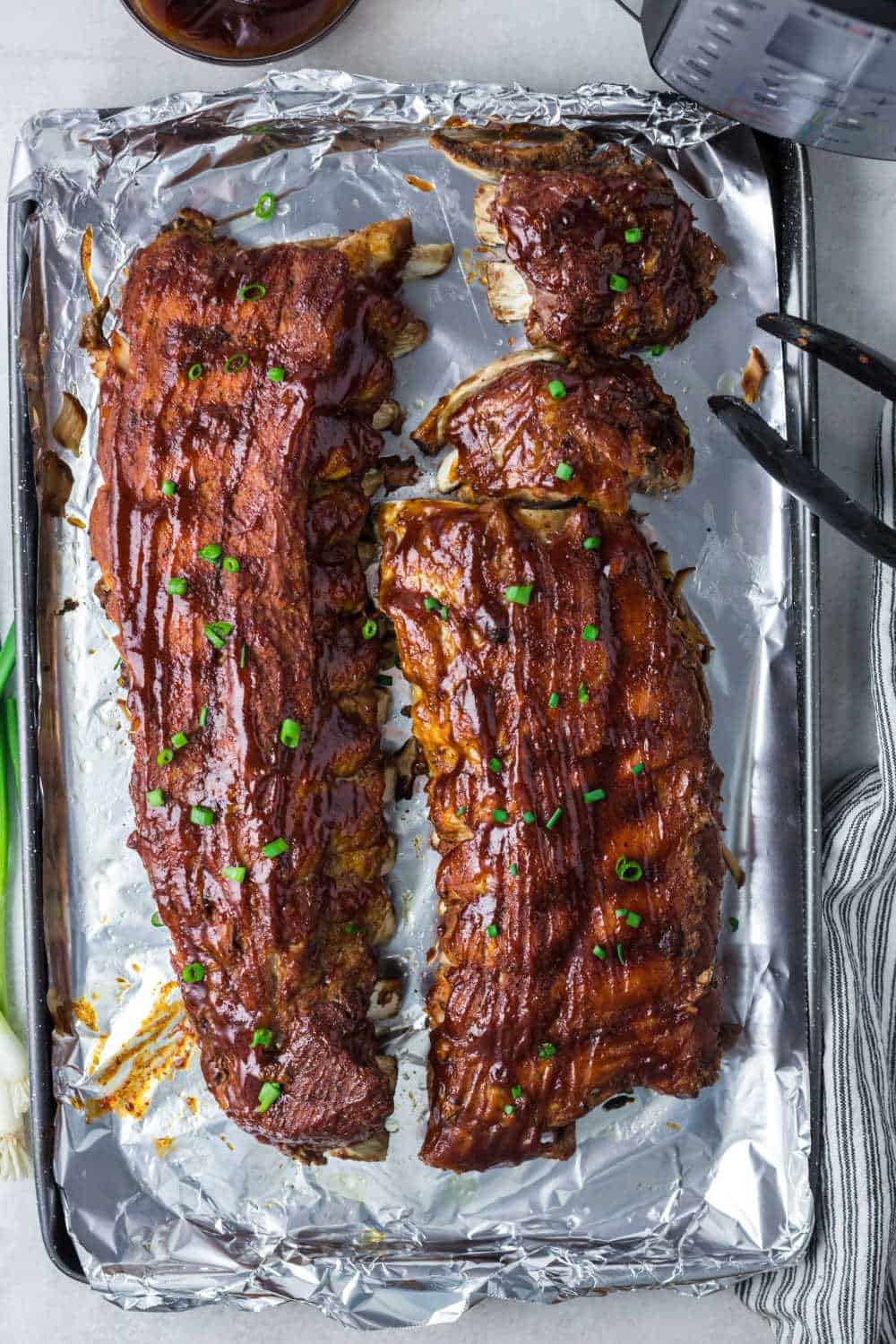 Instant Pot BBQ Pork Ribs on a baking sheet.