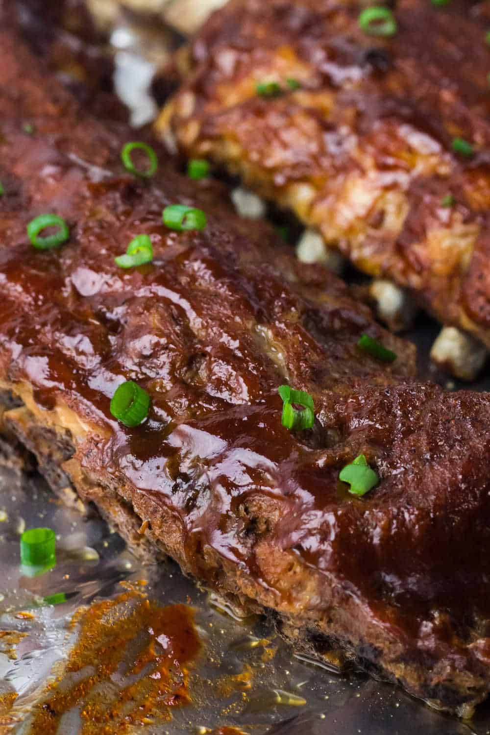 Instant Pot BBQ pork ribs on a baking sheet.