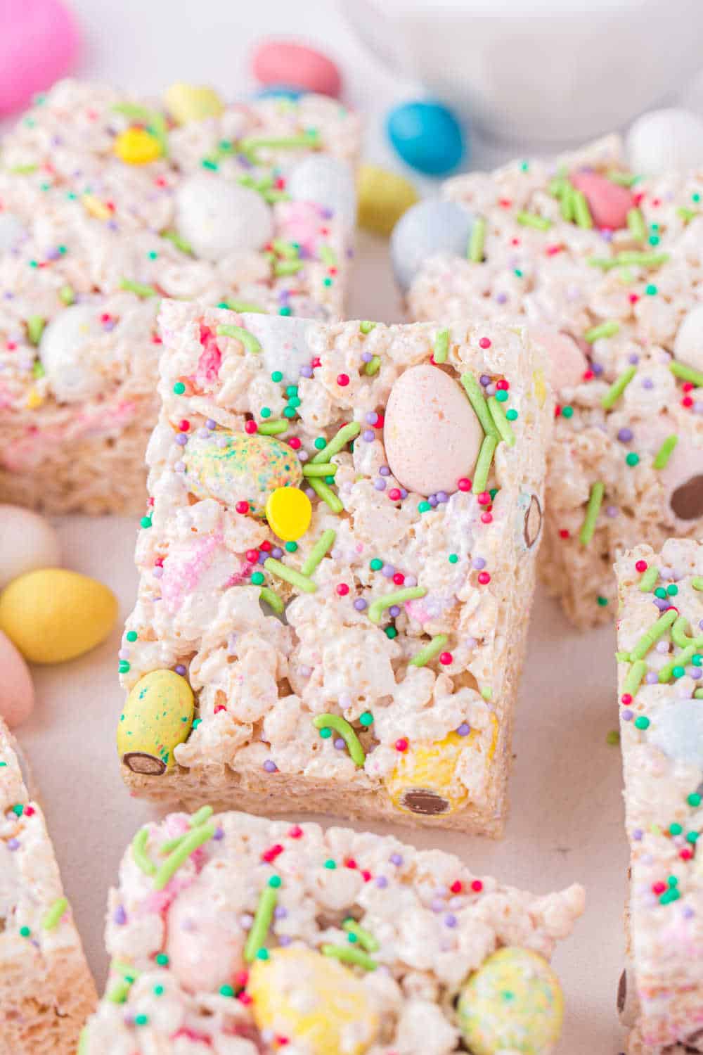 Leftover easter candy rice krispie treats cut into squares.
