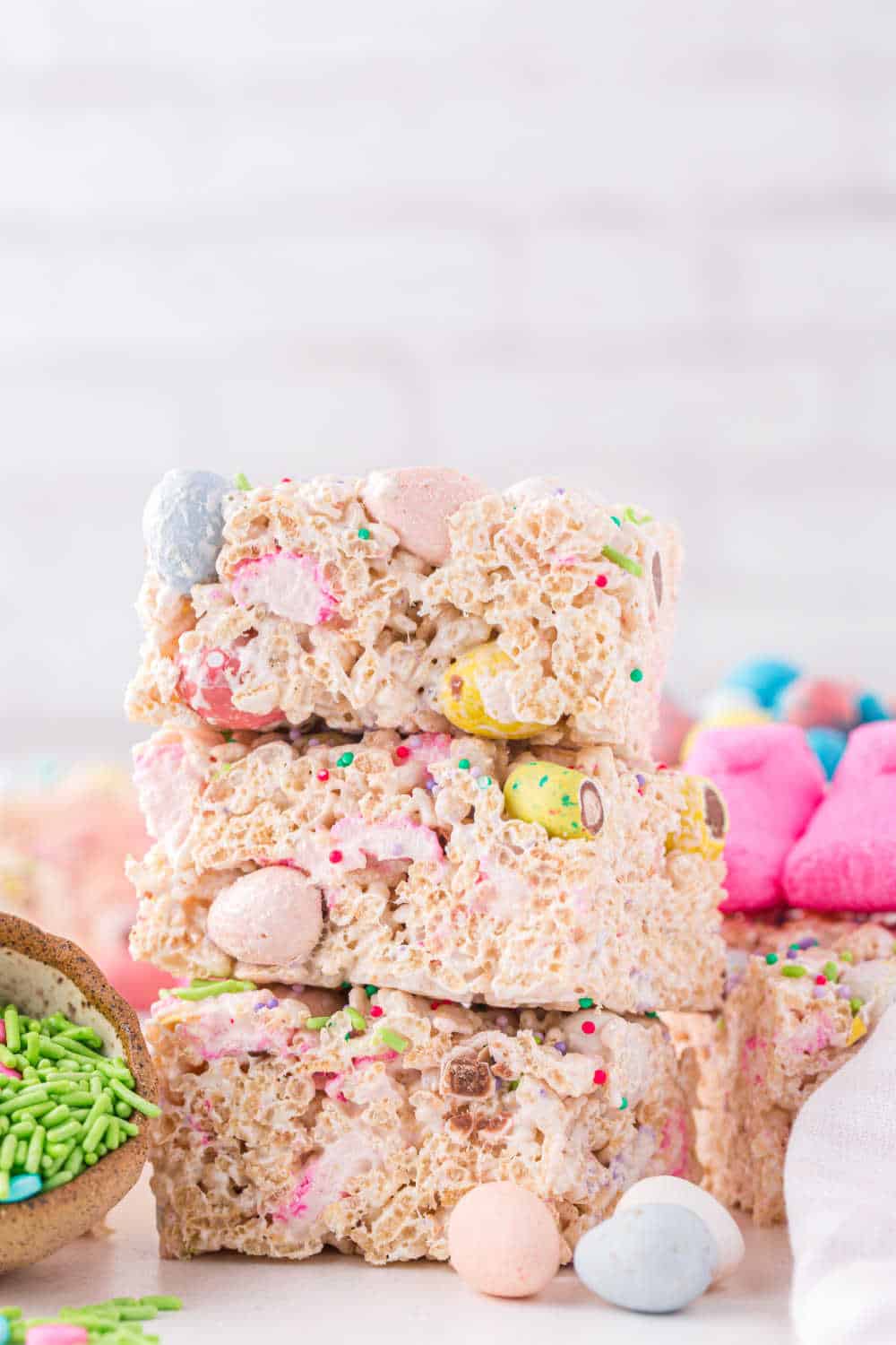 A stack of 3 easter candy rice krispie treats.