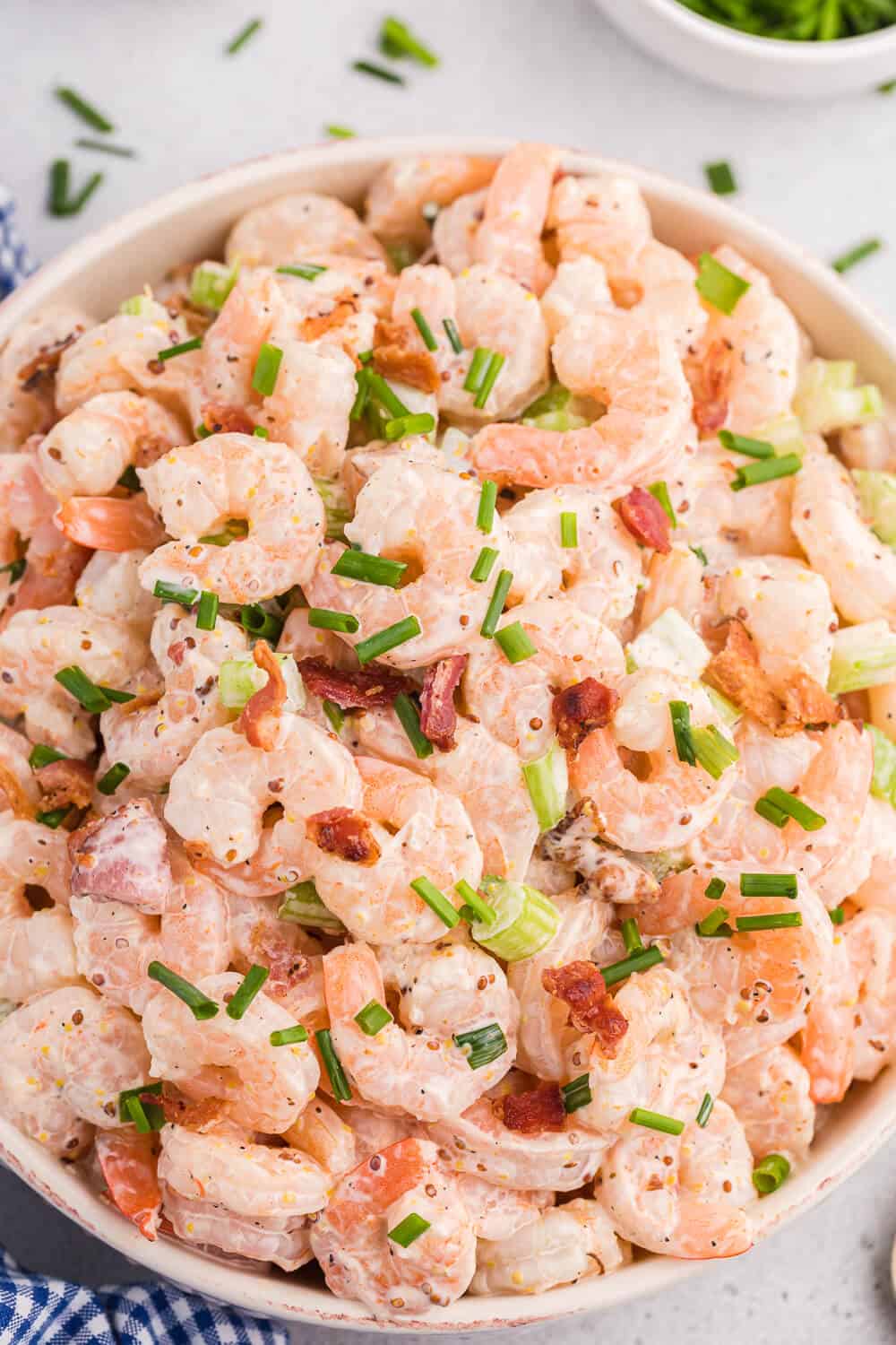 A bowl of shrimp salad.