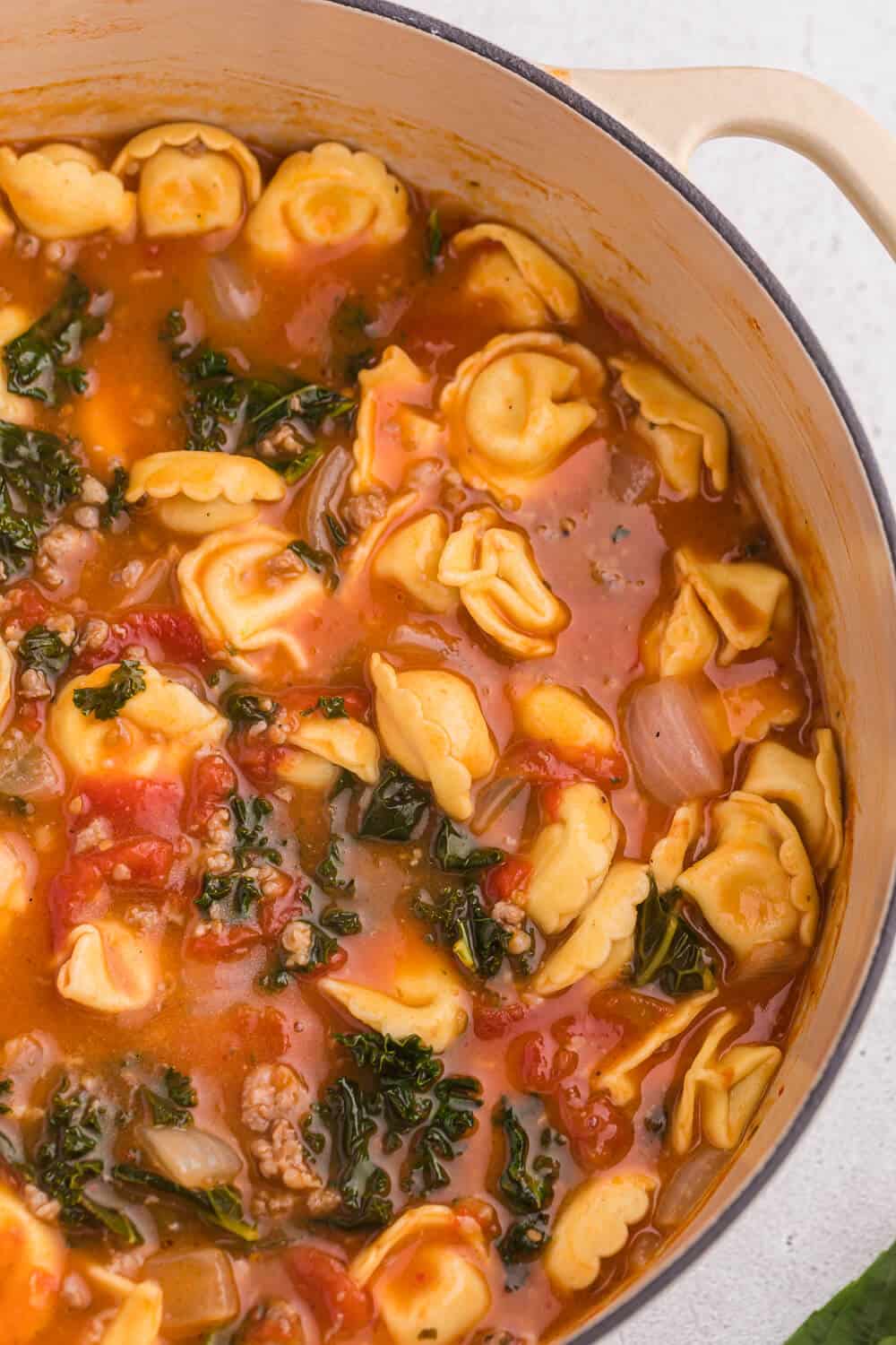 Tortellini soup in a dutch oven.