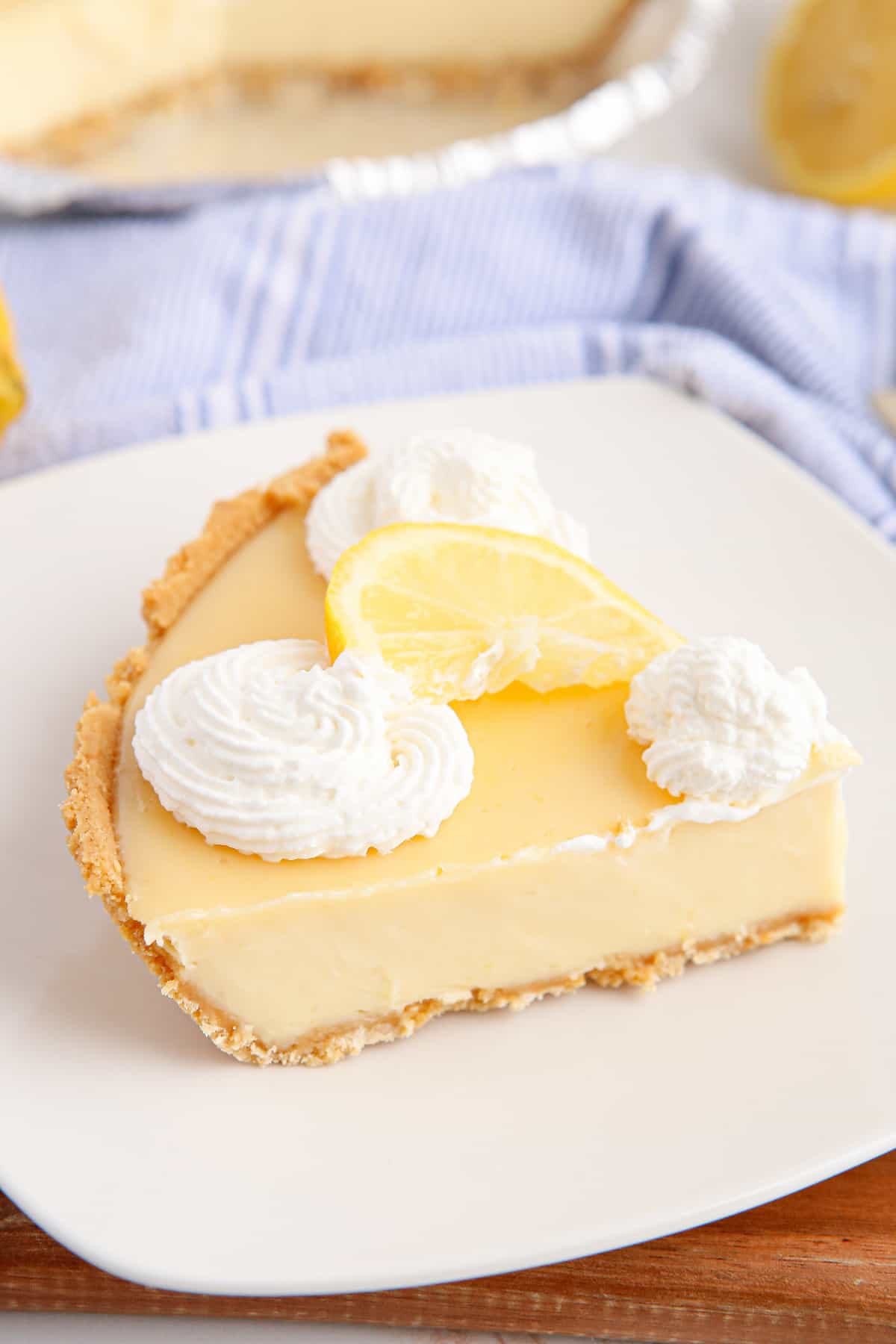 Classic lemon pie slice on a plate.