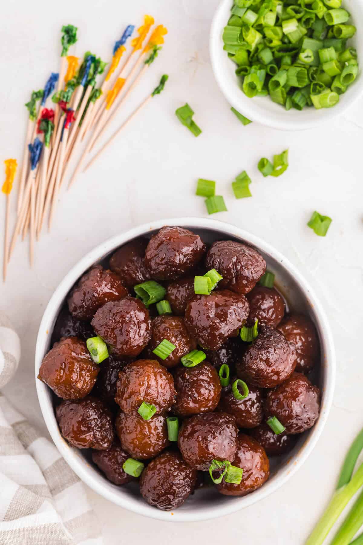 Grape jelly meatballs in a bowl.