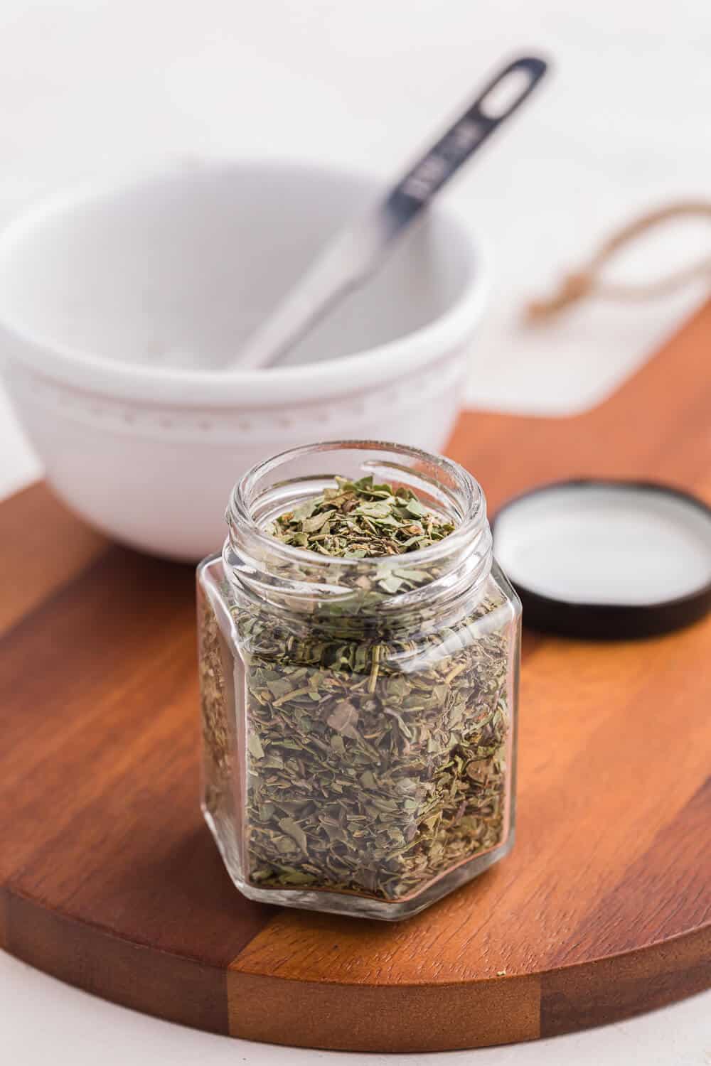 Italian seasoning in a spice jar.