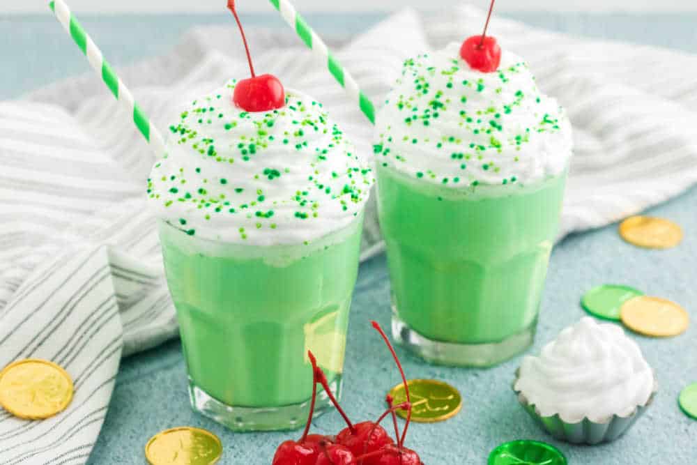 Two Shamrock Shakes in glasses.