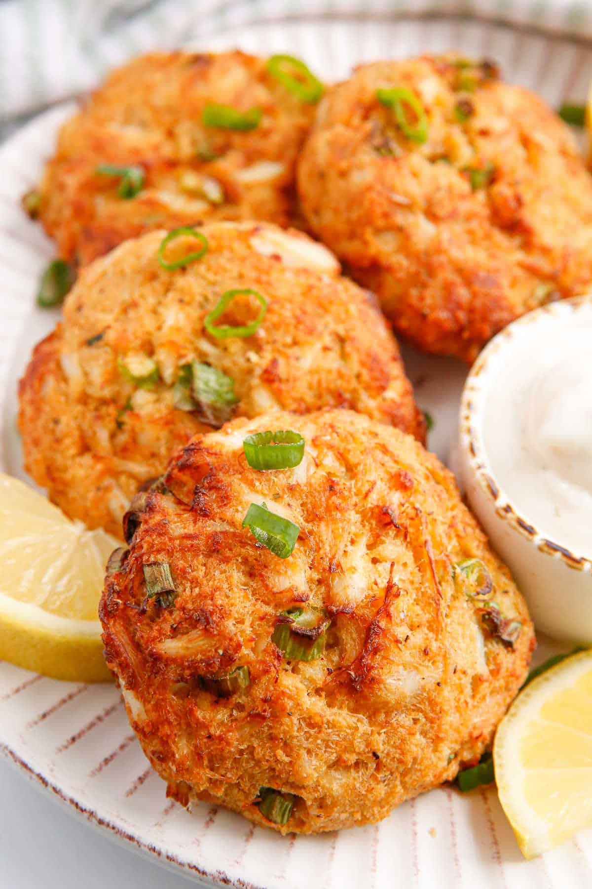 Air fryer crab cakes on a plate.