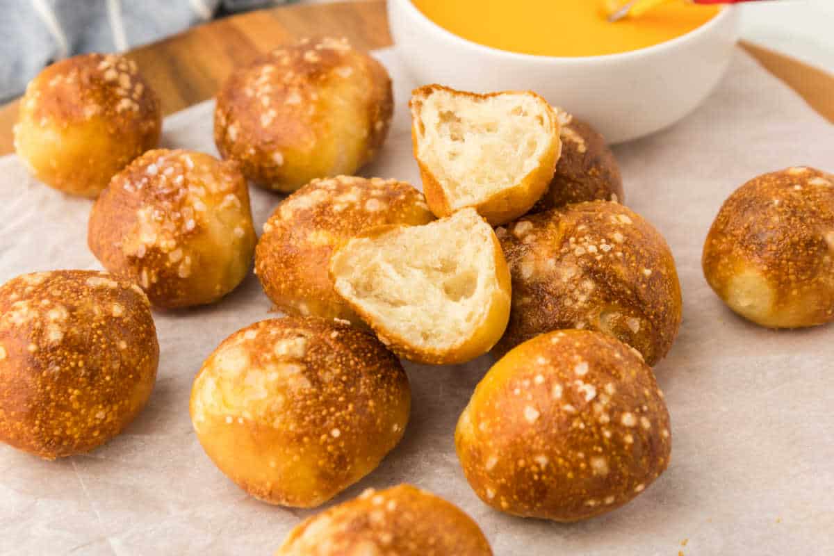 Air fryer pretzel bites on a parchment paper.