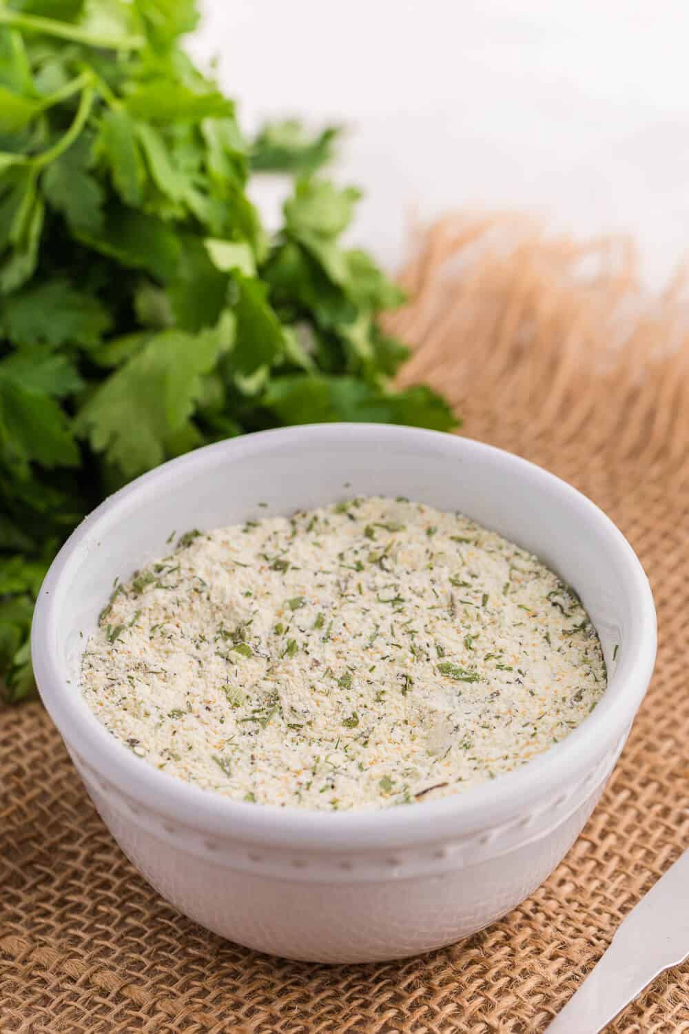 Ranch seasoning in a small white bowl.