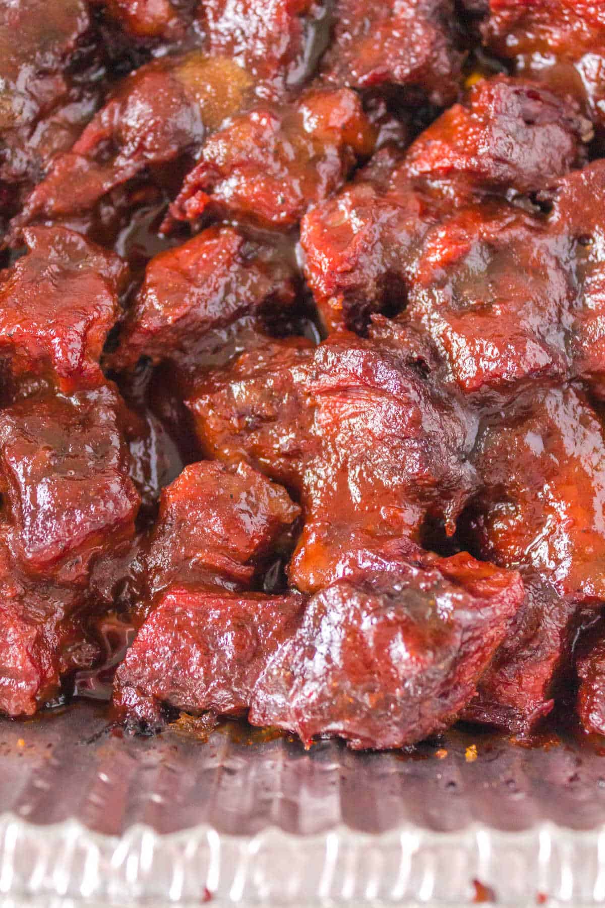 Burnt ends in an aluminum pan.