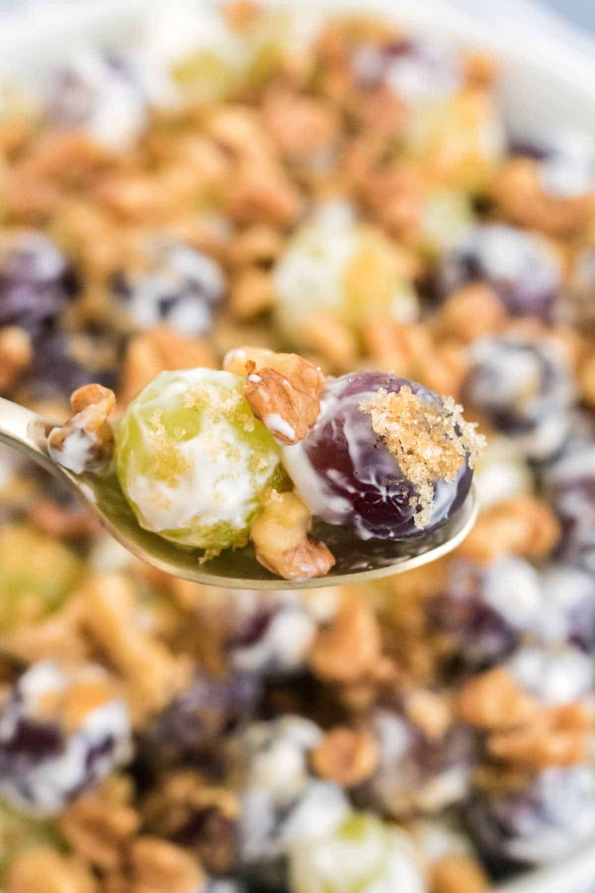 Grape salad on a spoon.