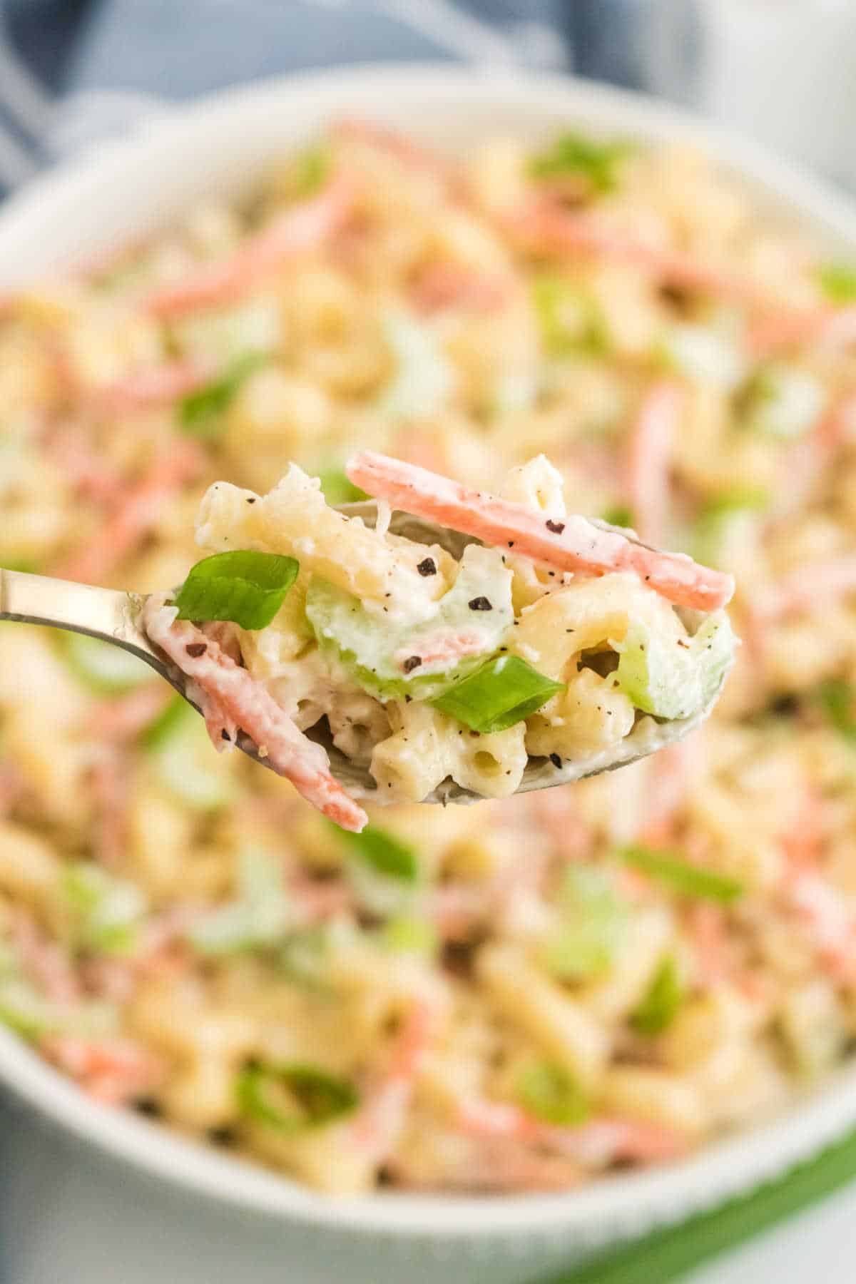 Hawaiian macaroni salad on a spoon.