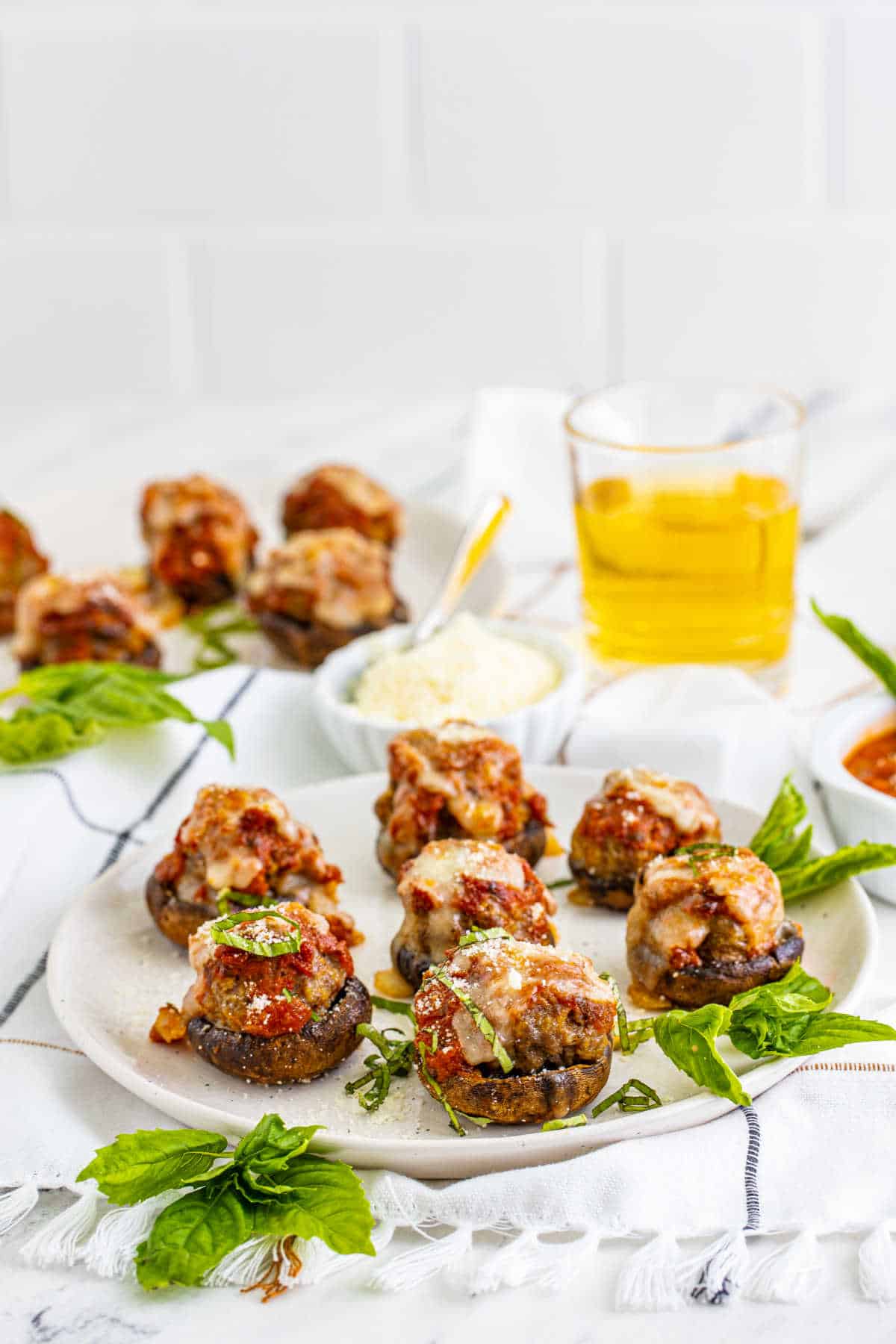 Meatball stuffed mushrooms on a plate.