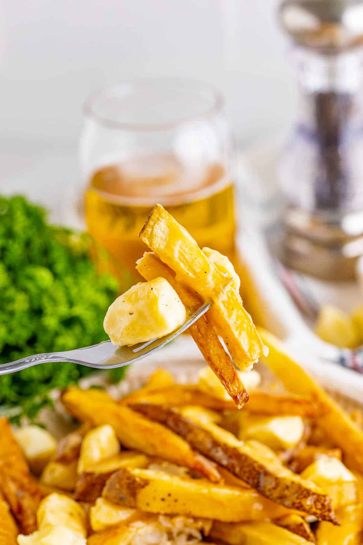 Poutine on a fork.